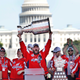 After winning the Stanley Cup last year, the Washington Capitals wore gear at their parade, including the hats here, made exclusively by Fanatics.